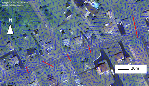 Satellite photo with dark blue mesh overlay delineating drainage and connectivity, with five culverts highlighted in red.