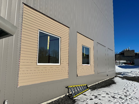 Two in-situ wall openings on the south façade of the building