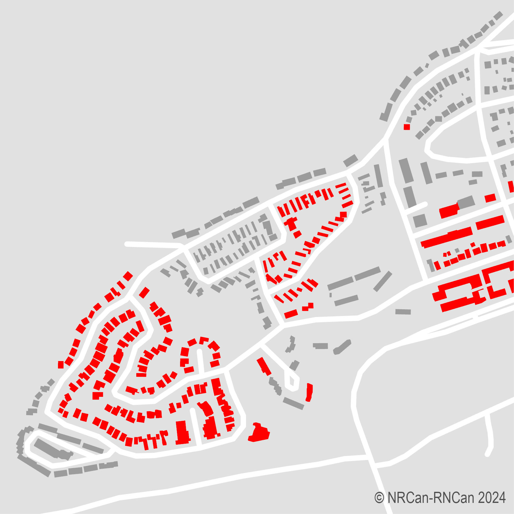 A map of CCMEO EGS’ rapid damage assessment of a Jasper neighbourhood showing structures
        destroyed by wildfire in red, and intact structures in grey.