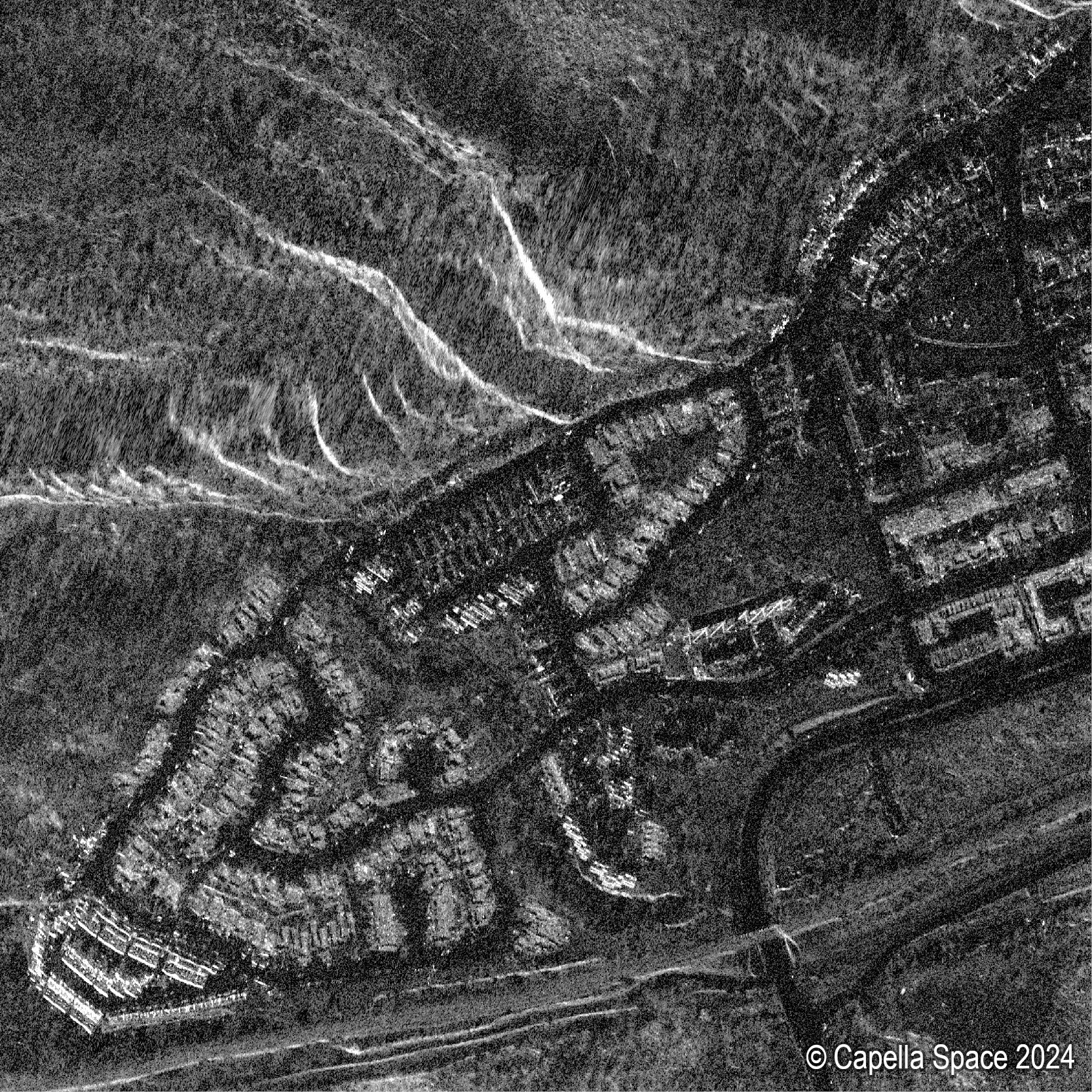 A very high-resolution synthetic aperture radar satellite image of the same Jasper
        neighbourhood used to confirm analysis of the RCM image.