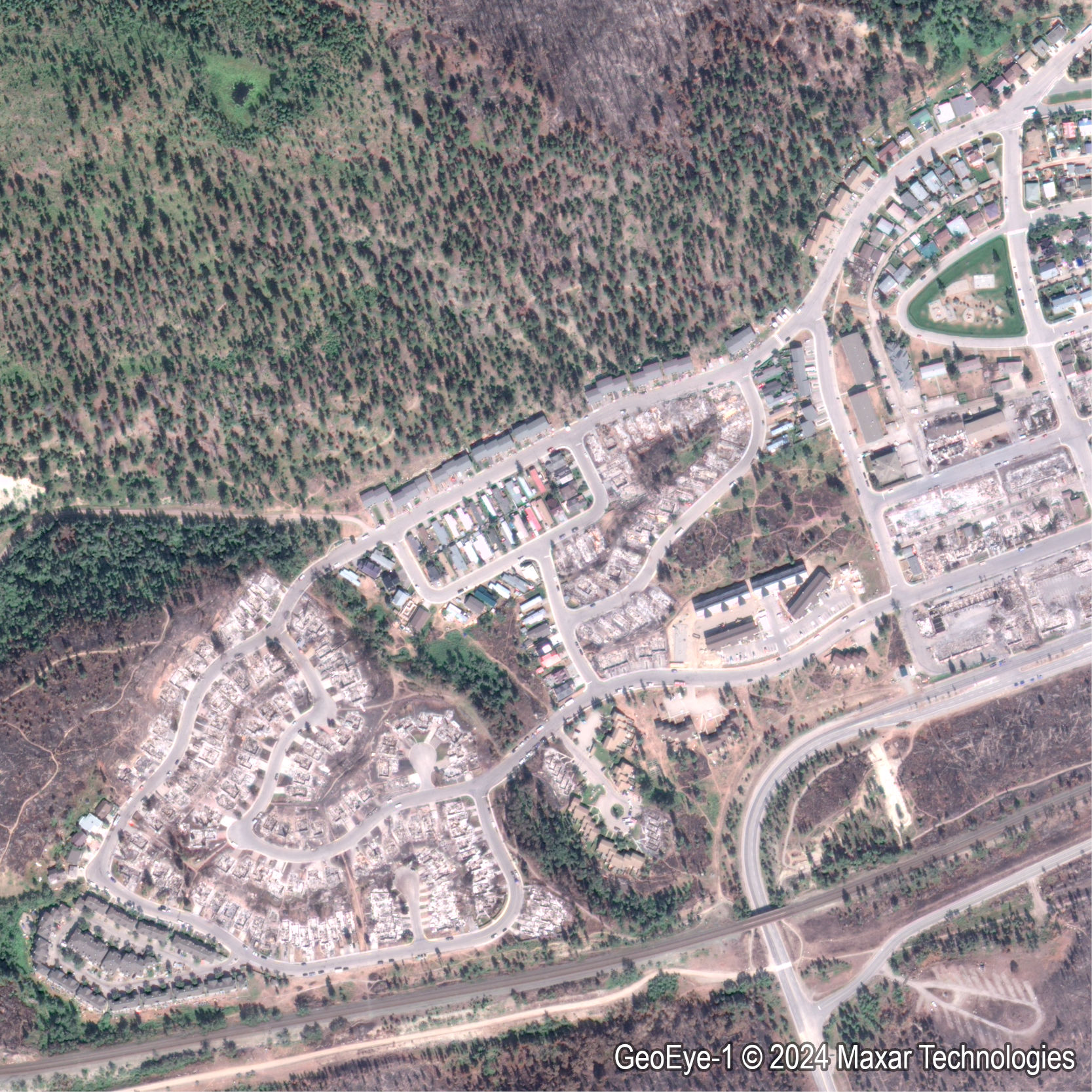 The first cloud-free high-resolution optical satellite image of the same neighbourhood.