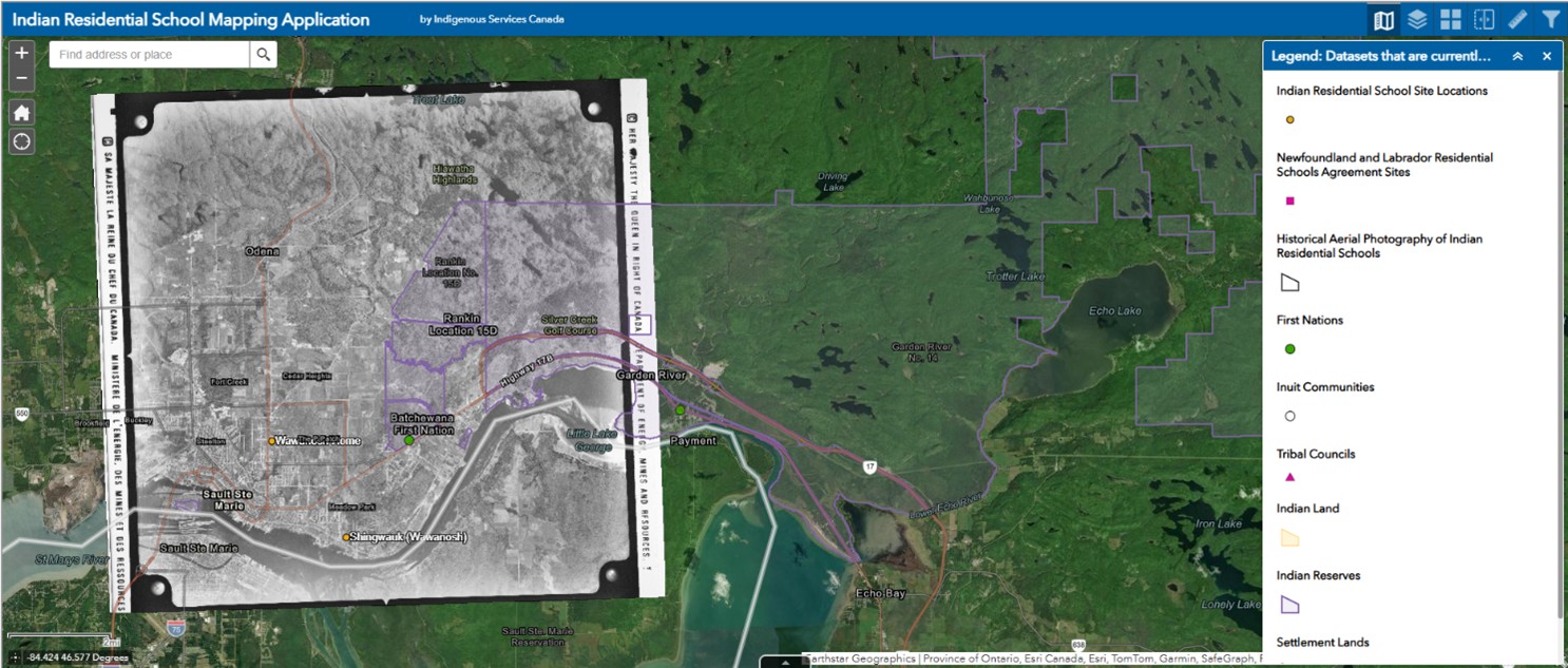 Indian Residential Schools Interactive Map overlapping an historical air photo with current imagery