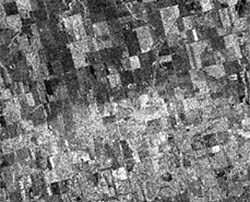 Shown here is a radar image acquired July 7, 1992 by the European Space Agency (ESA) ERS-1 satellite. This synoptic image of an area near Melfort, Saskatchewan details the effects of a localized precipitation event on the microwave backscatter recorded by the sensor.