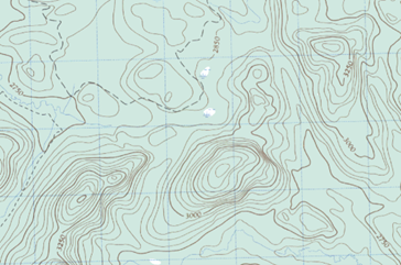 Contour lines shown on a map. Lines that are close to each other represent steep slopes.