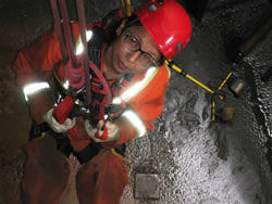 Picture showing an Indigenous woman working inside the Musselwhite Mine