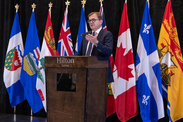 Minister Wilkinson speaking at the Energy and Mines Minister's Conference.