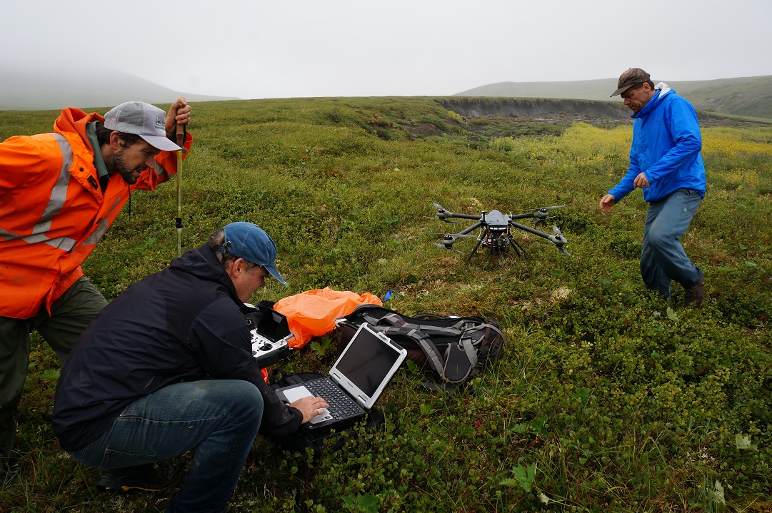 NRCan scientists working with the NWT Geomatics team