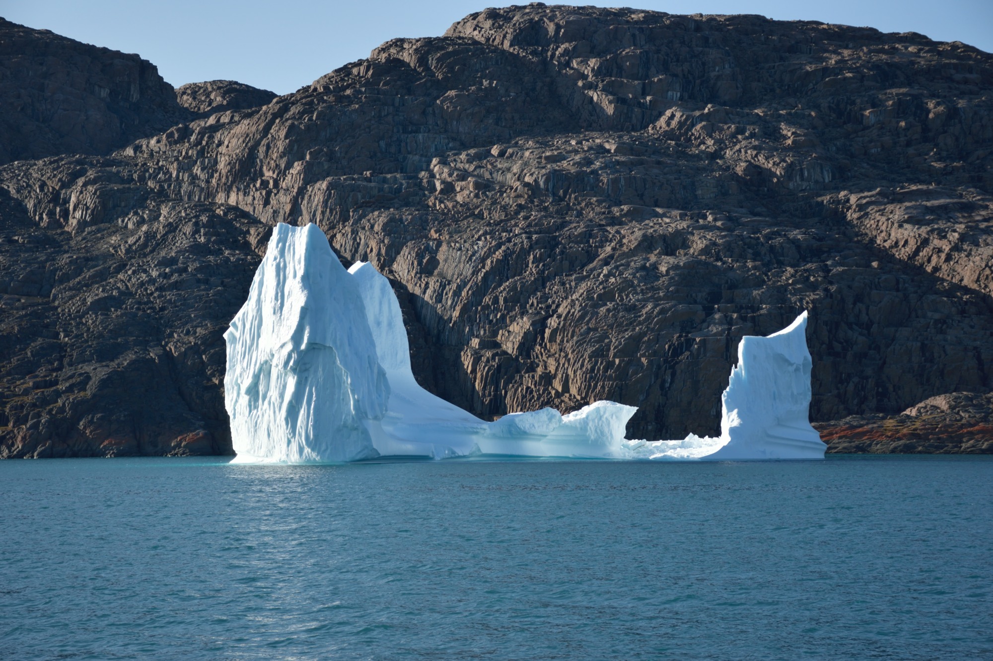 An iceberg floating on the Arctic Ocean.