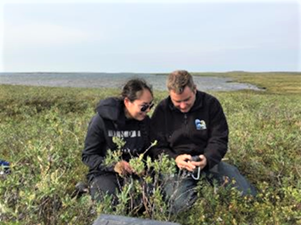 Dustin Whalen and Deva-Lynn learning and sharing while conducting coastal research.