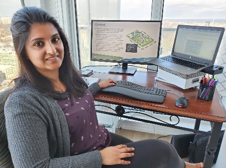 Photograph of Anjali Wadhera at her desk